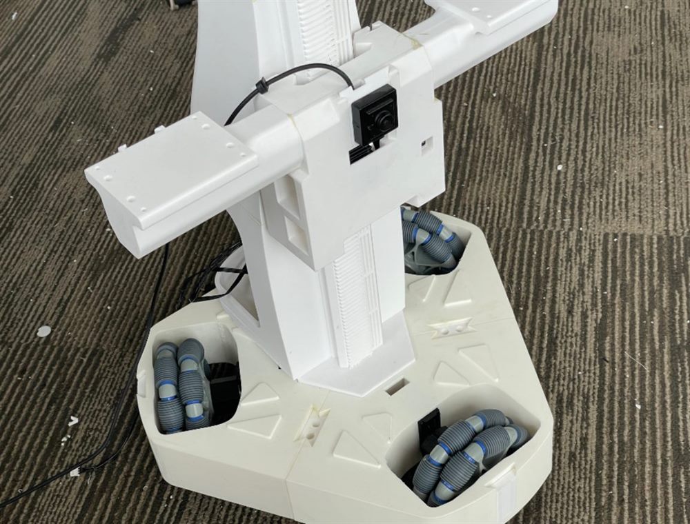 Follower arms mounted to the shoulder T-frame