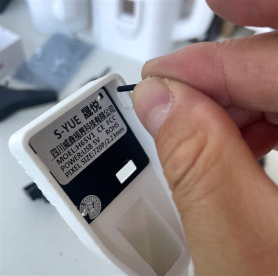 Top camera back cover installation