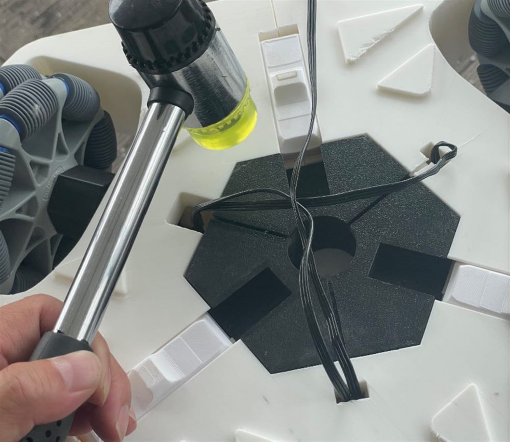 Locking the tower base into the chassis