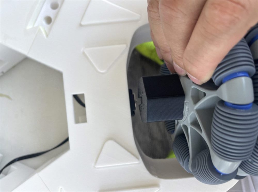 Tightening the wheel connector through the access opening